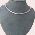 Pink stone silver base tennis necklace